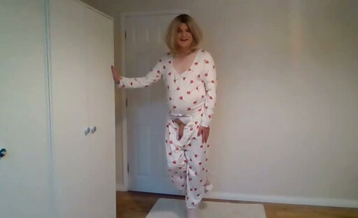 Blonde stripping out of cute pyjamas