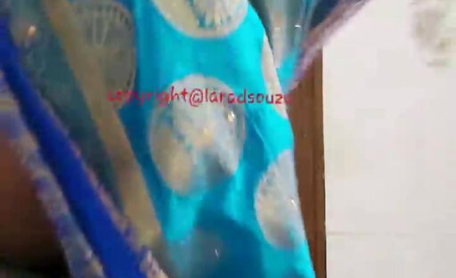 Indian beautiful crossdresser model in blue saree