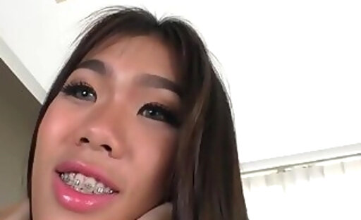 Exotic asian ladyboy Pat masturbate and pushes dildo into her tight butthole