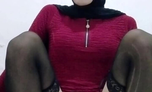 Hijab crossdresser masturbating with eggplant