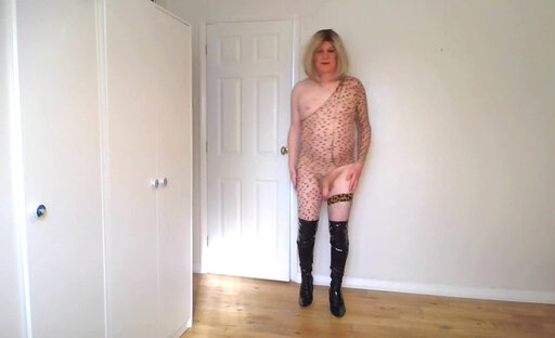 Blonde in leopard print bodystocking and black boots