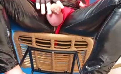 Teasing mature latex transvestite