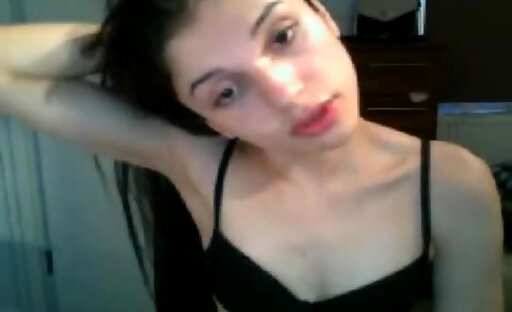 Amateur teen posing in front of her webcam