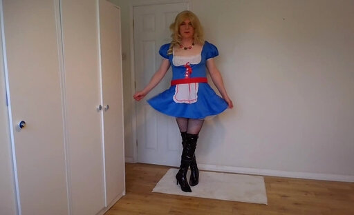 Stripping out of my blue costume in fishnets and no panties