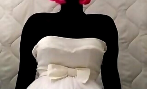 ebony nylon doll and short pale wedding dress