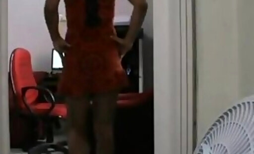 Brazilian crossdresser in orange dress CD brasileira em