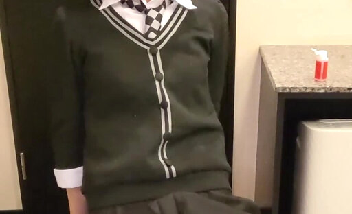 Cosplay crossdresser play a dildo