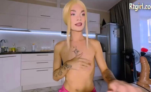 skinny germany blonde tgirl with tattoos jerks off her big dick