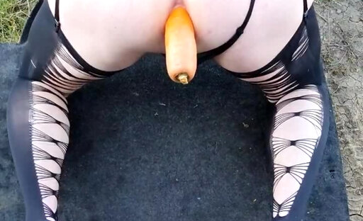 CD Outdoor dressed fuck with huge carrot anal play . Part 1