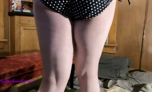 Daphne in her dressing room changing skirts