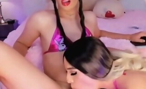 Gorgeous Tranny Duo Sucking Cock and Balls