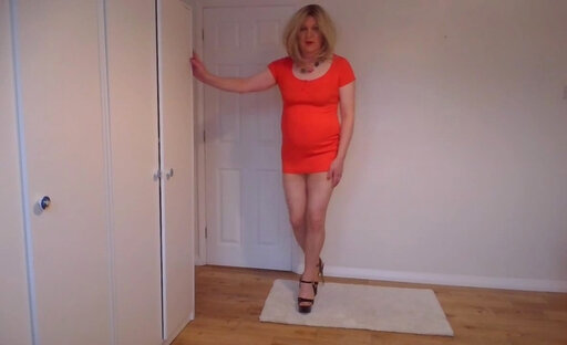 Red minidress, nude pantyhose and black high heels