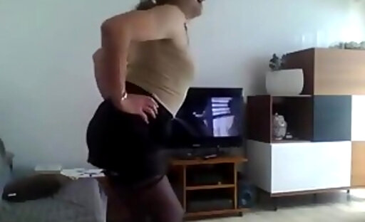 Crossdresser in skirt panties top